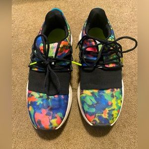 Under Armour shoes. Size 7 in women. Color: pink, blue, green, black.